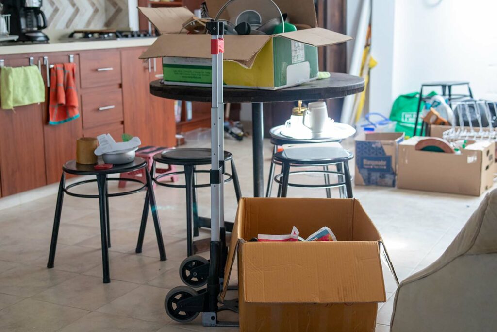 Spring declutter, room full of clutter and boxes, ATS Skip Hire blog post